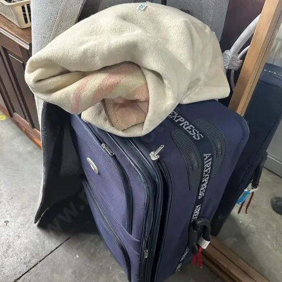 blanket and suitcase