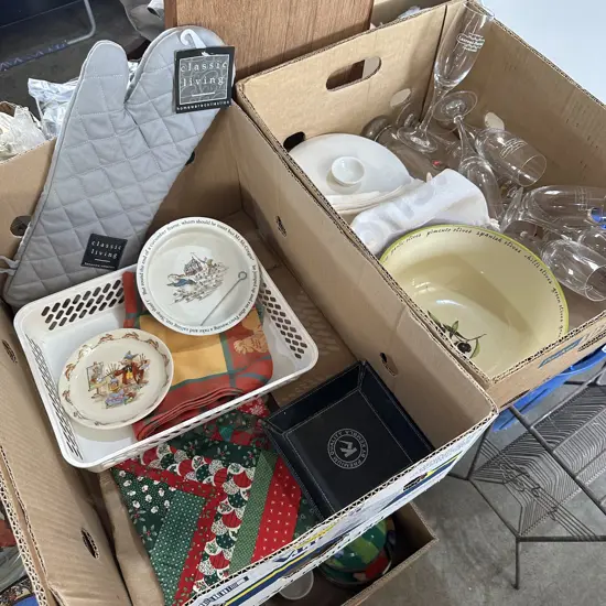 Two boxes with champagne flutes, new oven mitt and bunnykins saucer etc.