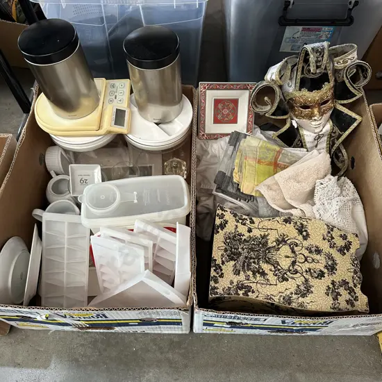 Two boxes Tupperware, towels, canisters etc.