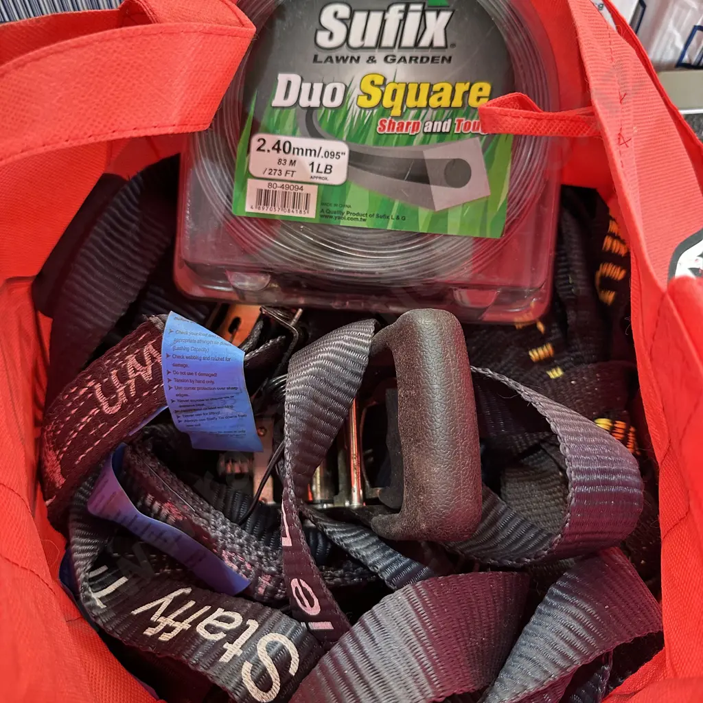 Bag of tie downs and strimmer line. Image 1++