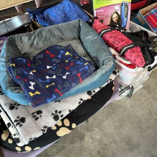 Large lot of dog beds, blankets, dog clothes and grooming clipper etc.
