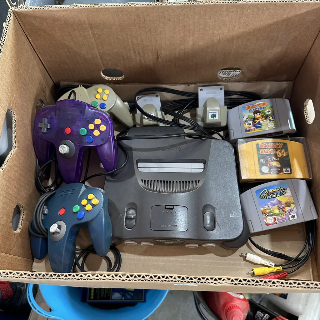 Box of Nintendo 64 Console, controllers and games etc. Image 1++