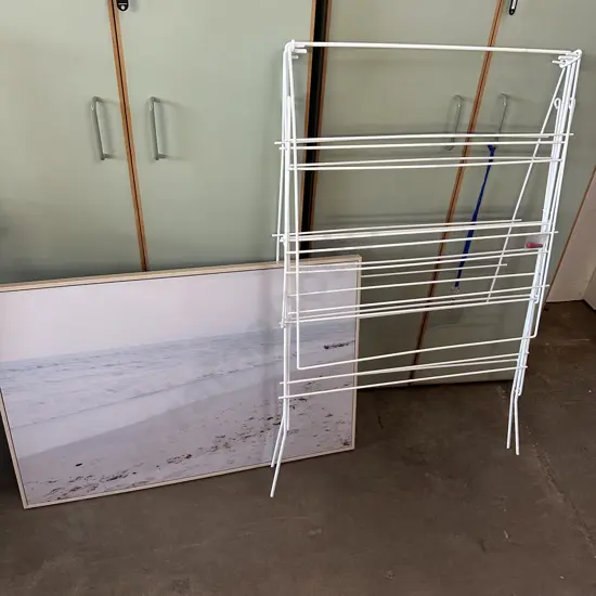 picture and clothes horse