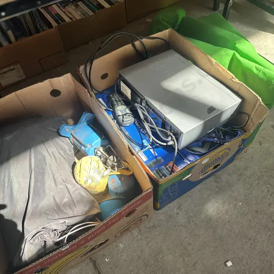 2 boxes, tent, gas cooking, DVD player, VHS, material, leads