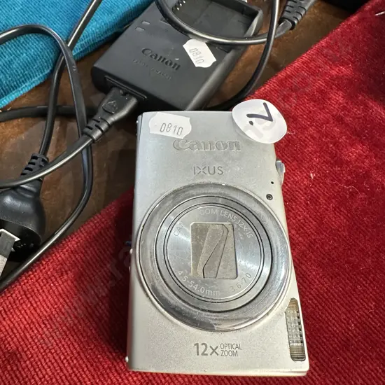 Canon IXUS 265 HS camera and charger