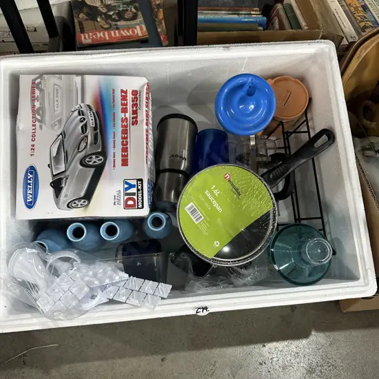 Box lot model car, new saucepan etc.
