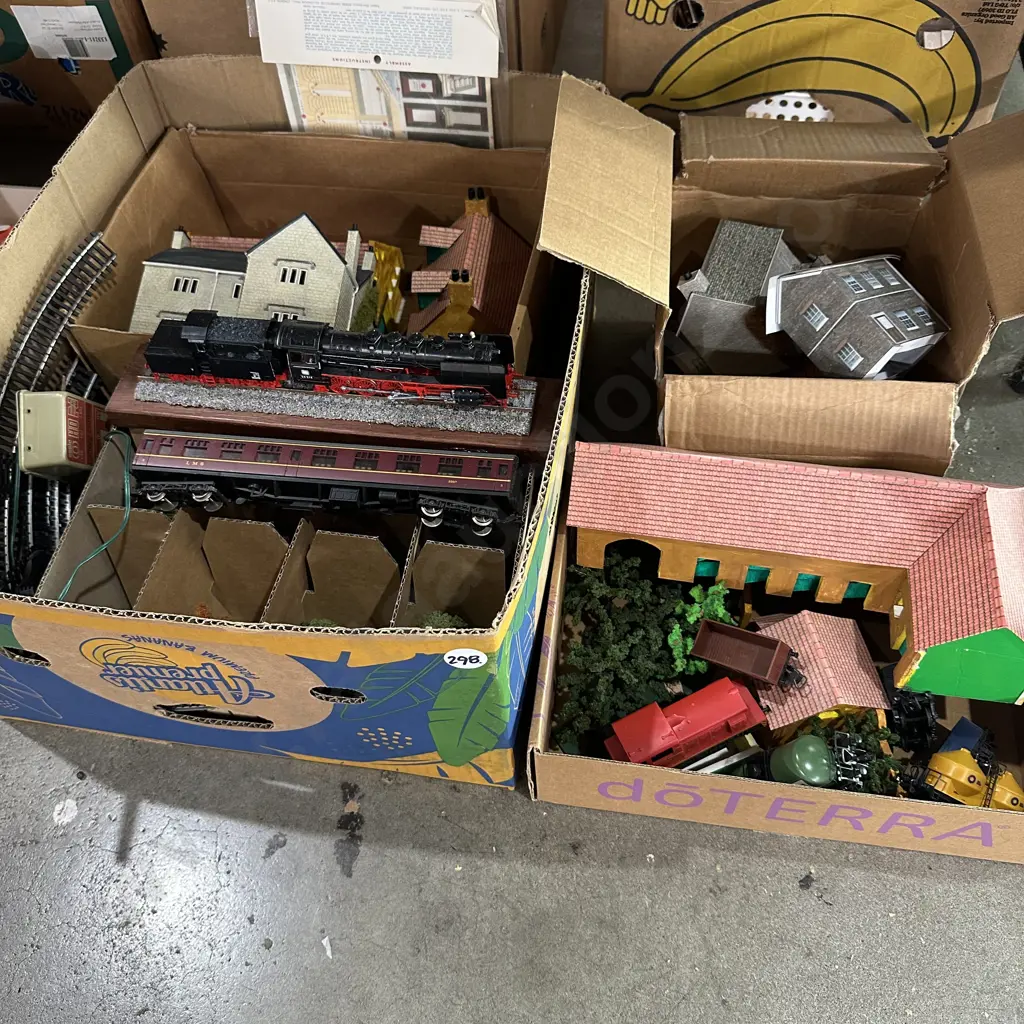 Two boxes trains, tracks, houses, and accessories. Image 1++