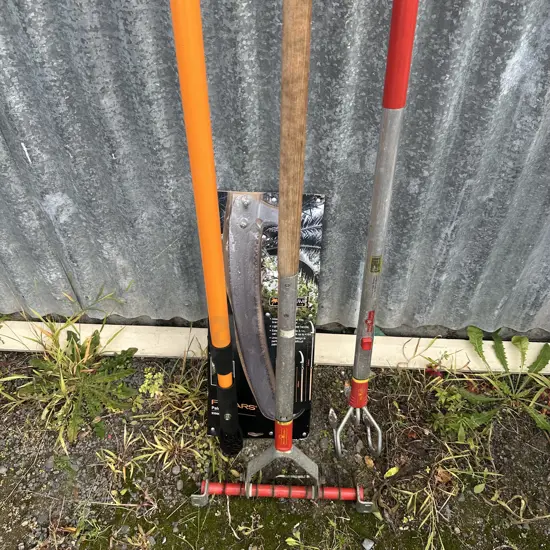 Pruning saw and extension plus two other tools.