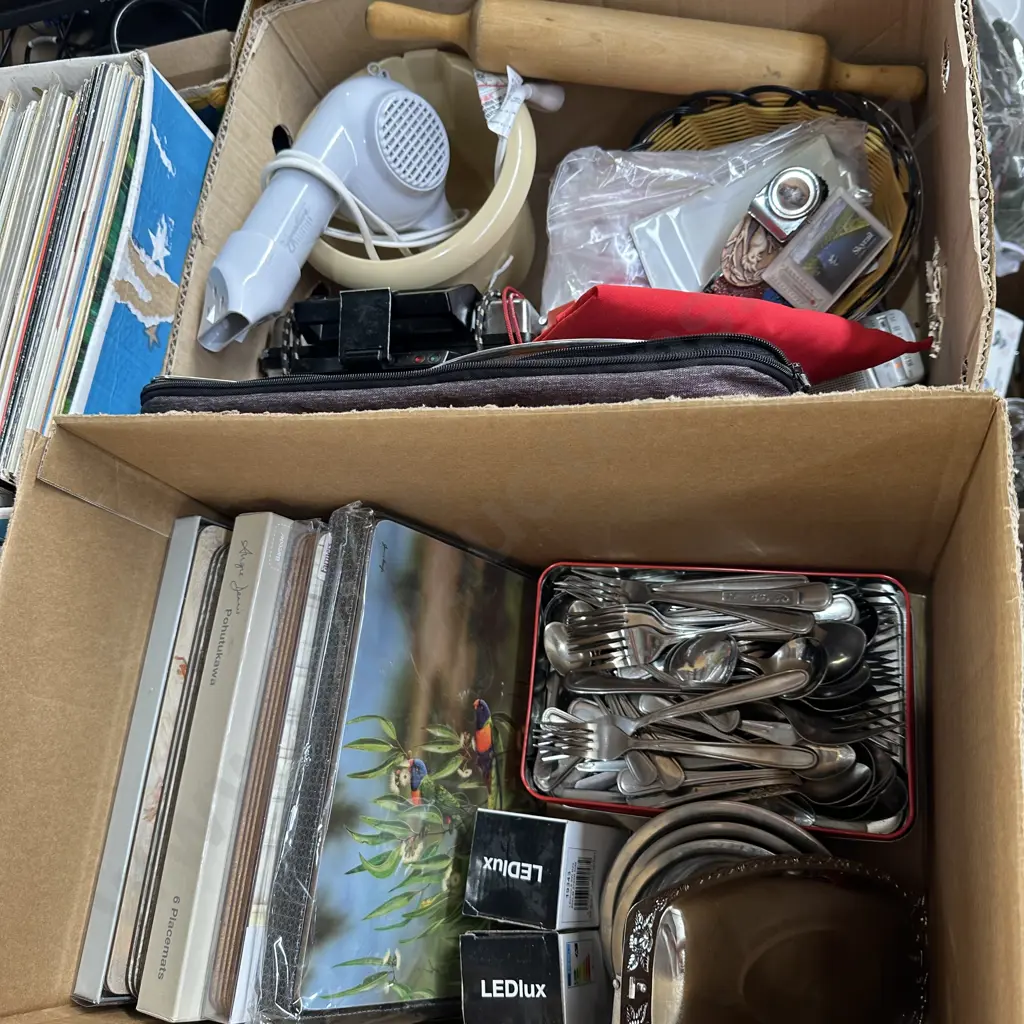 Two boxes cutlery, placemats, emergency radios etc. Image 1++