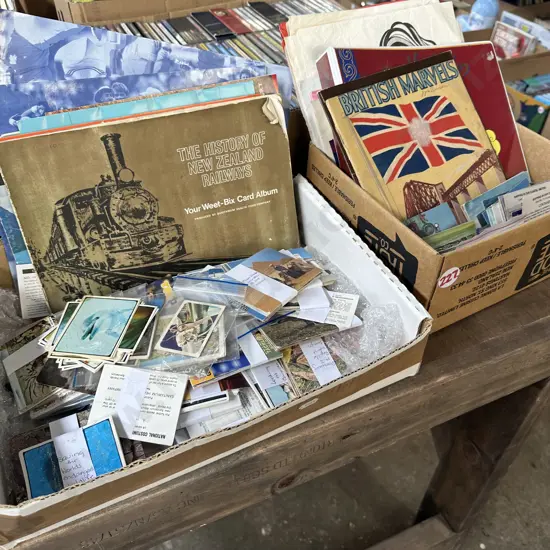 Box of collectables including Aladdin and Sanitarium cards etc.