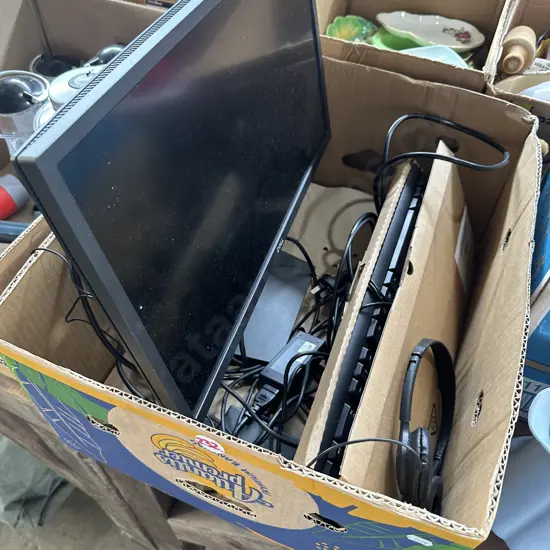 Two keyboards, screen, mouse and headset.
