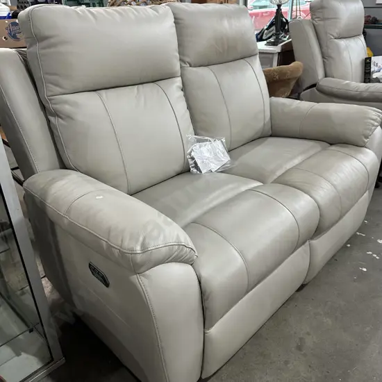 The matching electric leather sofa - just needs a clean