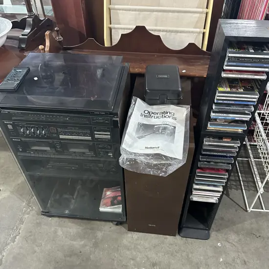 stereo system with turntable and CD colection plus bookcase