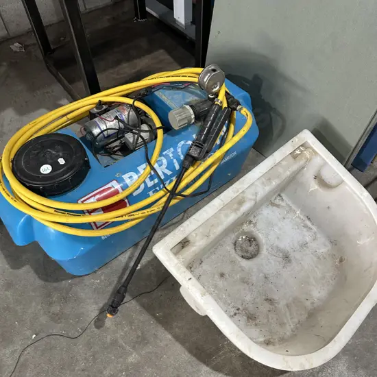 Four wheeler sprayer and plastic bin attachment