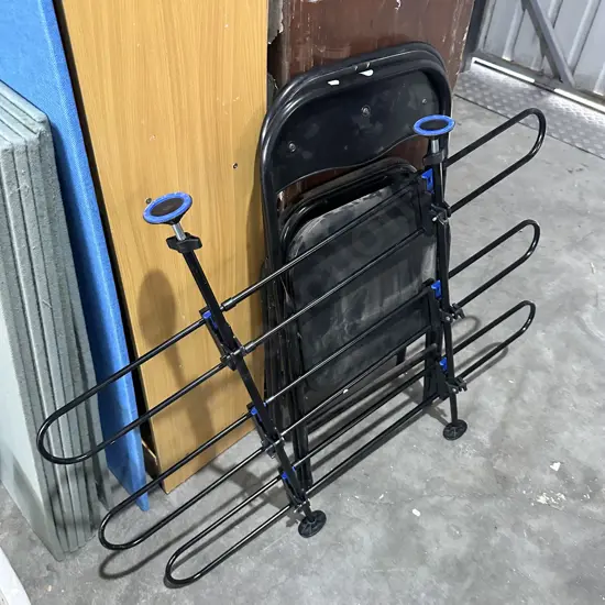 Cargo shield and two folding chairs.