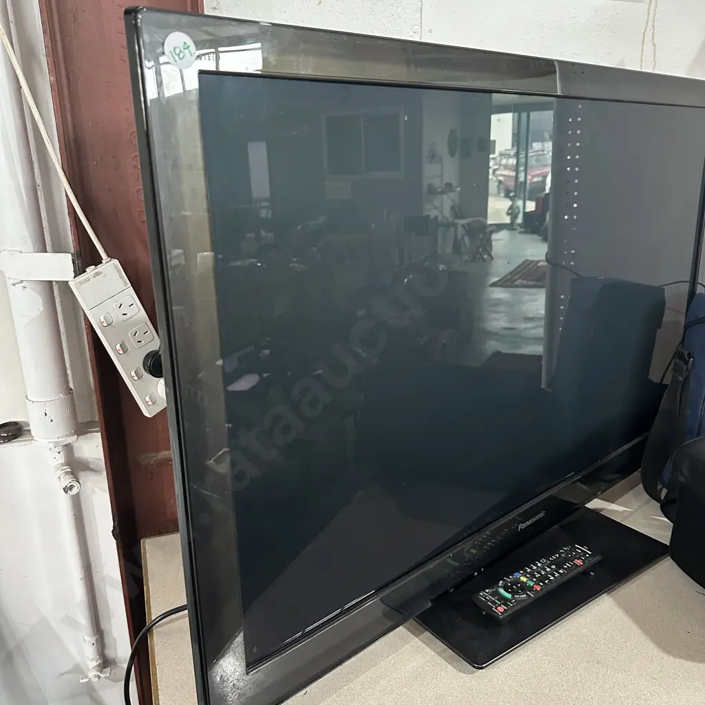 large panasonic TV and remote working Image 1++