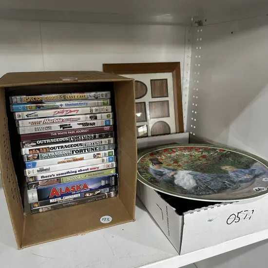 DVDs , frames and collectors plate