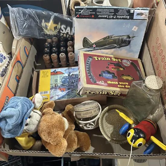 Box of toys including buzzy bee.