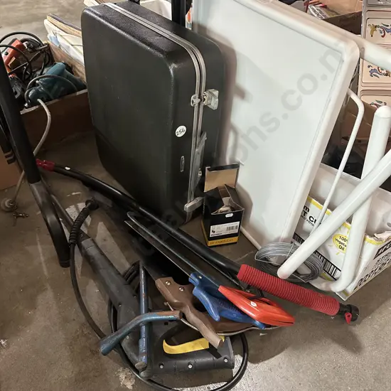 Briefcase, folding table, tools including water blaster wand.
