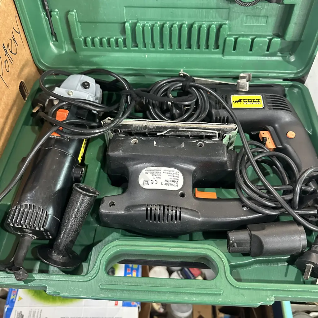 Colt electric drill, sander, grinder set plus case. Image 1++