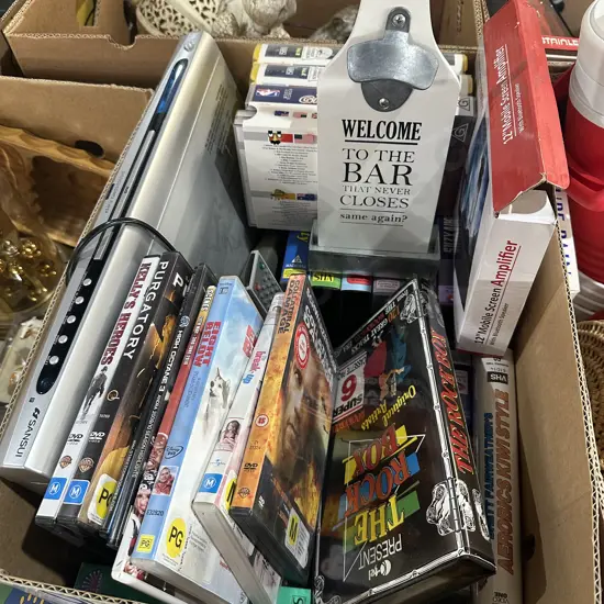DVD Player and DVDs, childrens videos, BAR sign.