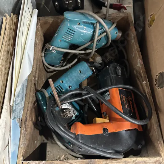 Nail box with three electric drills.