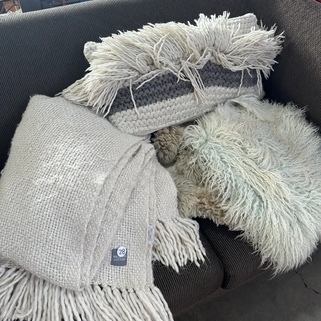 Wallace Cotton throw plus sheepskins and pillow Image 1++