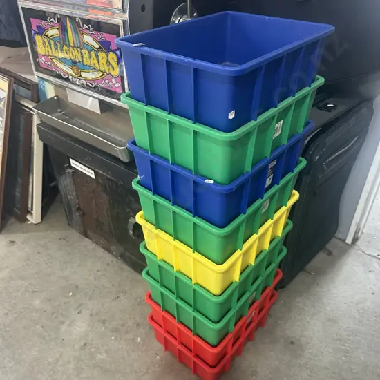 Nine coloured stackable bins.