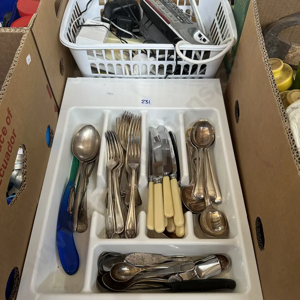 Tray of cutlery and bin of phone and electricals. Image 1++