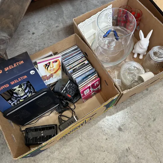 Two boxes step down transformer, good CDs, trifle dish etc.