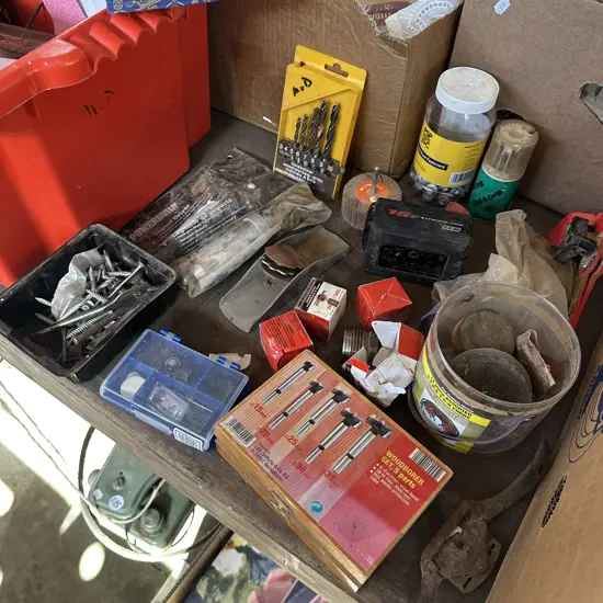 Large bin including impact driver, drill bits, Lithium battery, apron etc.
