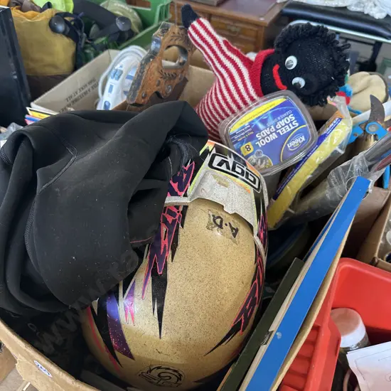 Box of assorted items including kids wet suit, hand saw, picture frames, etc.