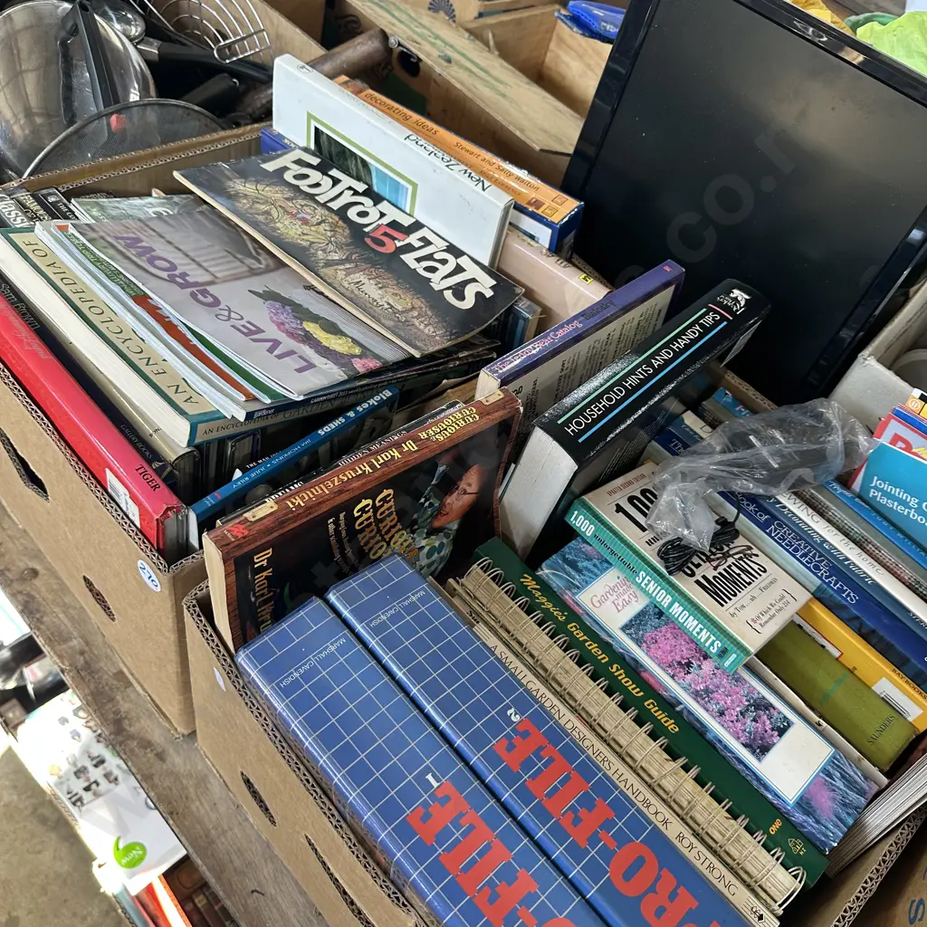 Two boxes of books including footrot flats plus small tv. Image 1++