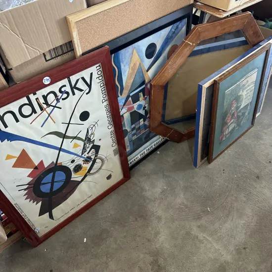 Mirror, pin board and pictures.