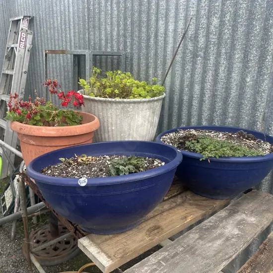 4 large plastic planters