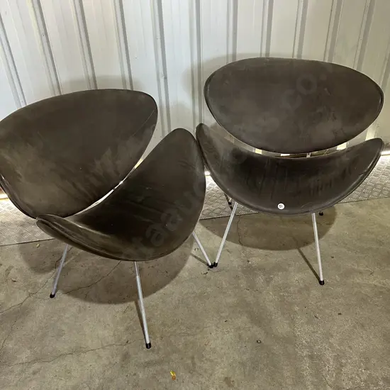 Pr of distressed leather lip chairs