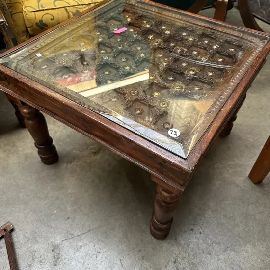 carved wooden base coffee table