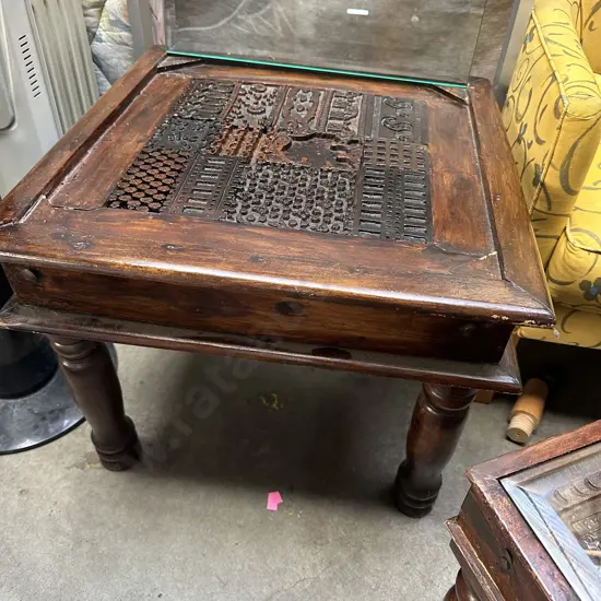 carved wooden base coffee table