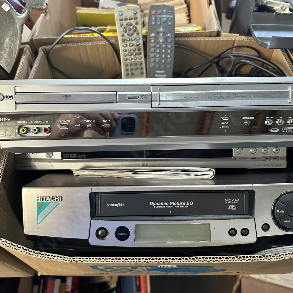 VCR player, DVD and VCR/DVD combo player plus remotes. Image 1++