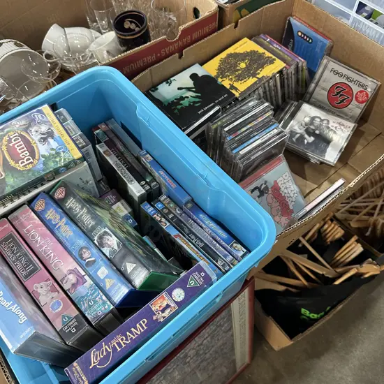 Box of good CDs plus bin of childrens videos and DVDs.