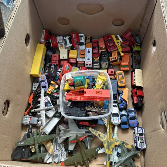 Box of toy cars and planes etc.