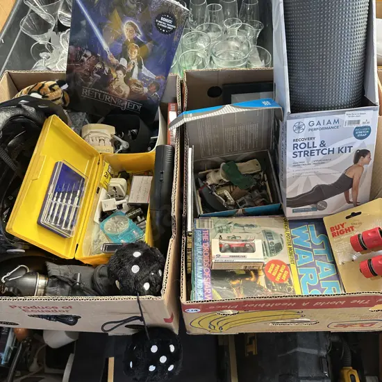 Two boxes Star Wars posters, bike helmet, body roller etc.