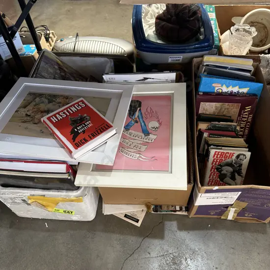 Three boxes of books and magazines.