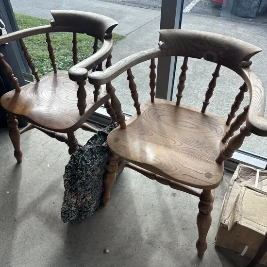 Pr of Elm captains chairs with padded seats