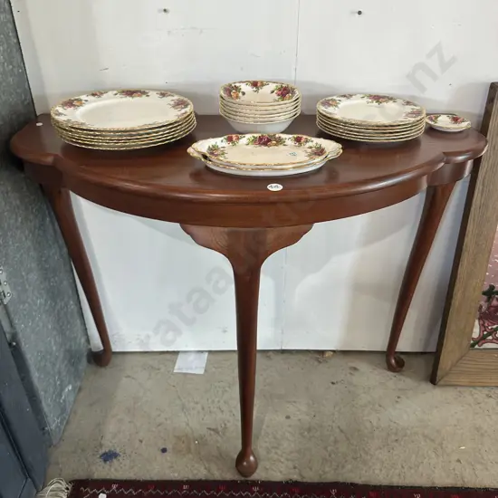 Mahogany half round cabriolet leg hall table