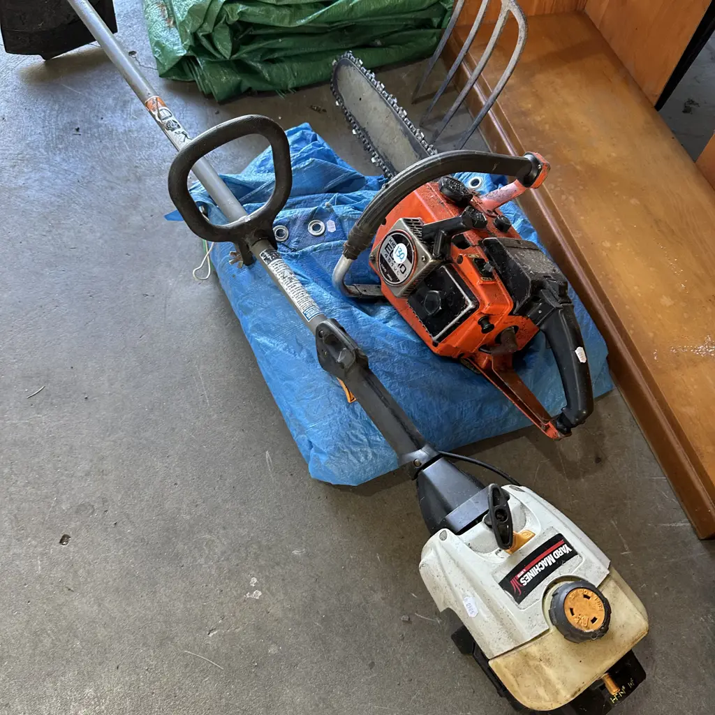 chainsaw, strimmer and tarp Image 1++