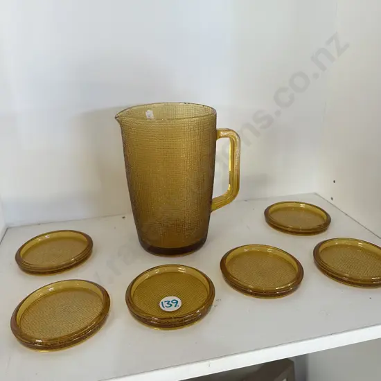 Water jug and matching coasters.