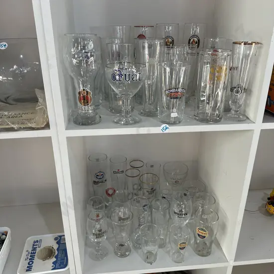 Large collection of beer glasses from all over the world.
