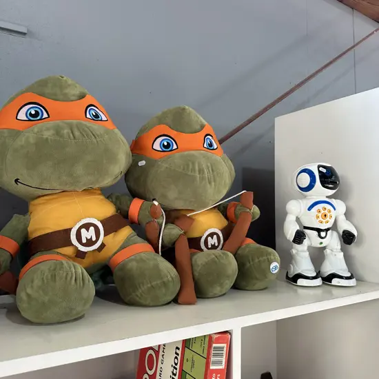 Pair of large soft turtles plus robot man.