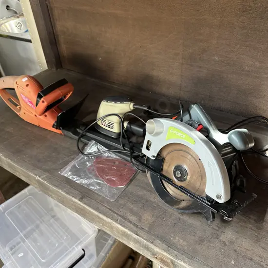 Hedge trimmer, skill saw, detail sander plus three pads.